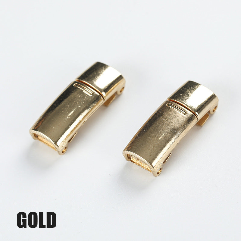 Magnetisk metallspenne for skolisser