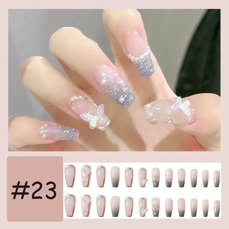 Bærbare trykk-på negleklistremerker