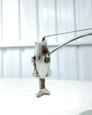 đŁSkulpturen med balanserende fisker