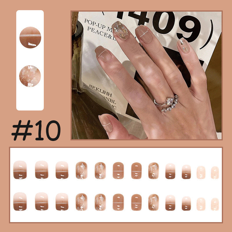 Bærbare trykk-på negleklistremerker