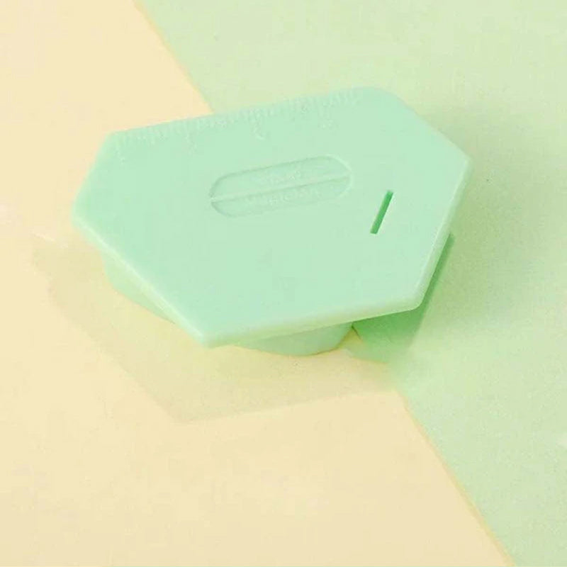 Polygonalt, sterkt magnetisk verktøy for posisjonering av symaskinens sidevegg