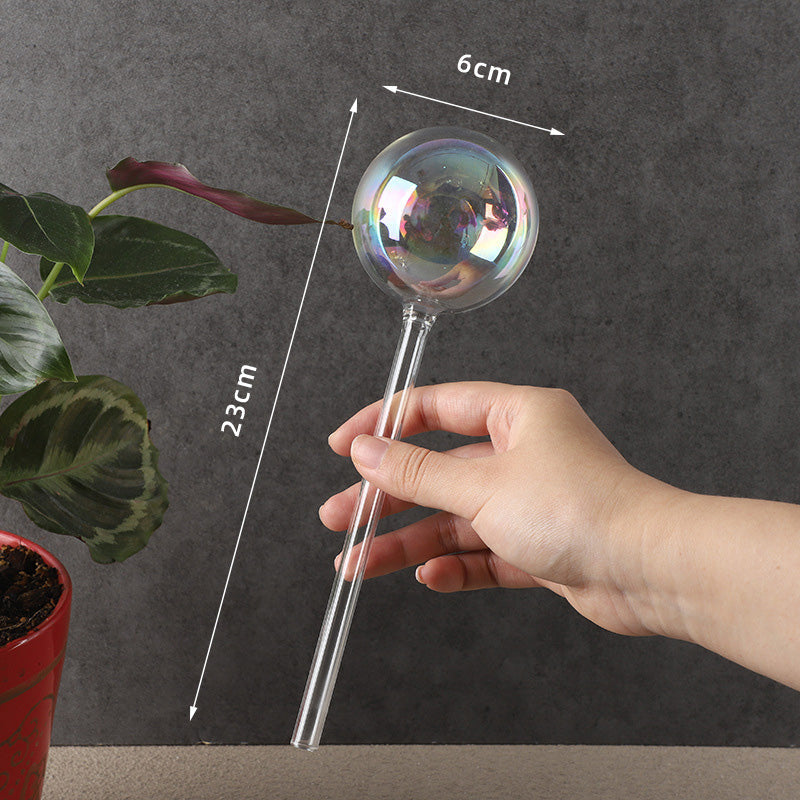 Fargerik soppvanningskanne/fargerikt automatisk vanningssystem laget av glass