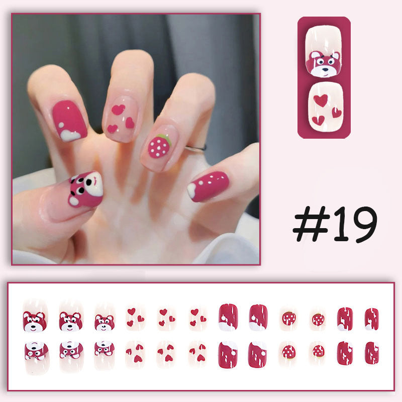 Bærbare trykk-på negleklistremerker