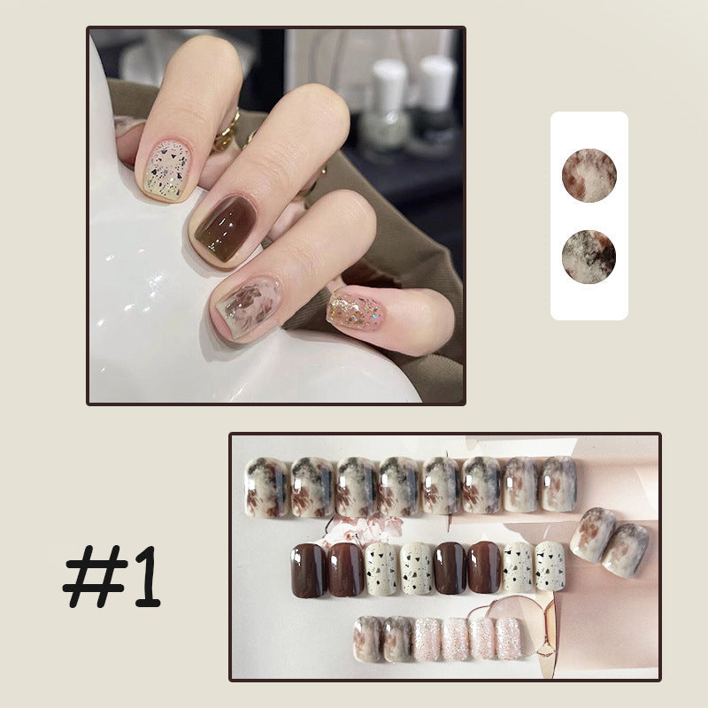 Bærbare trykk-på negleklistremerker