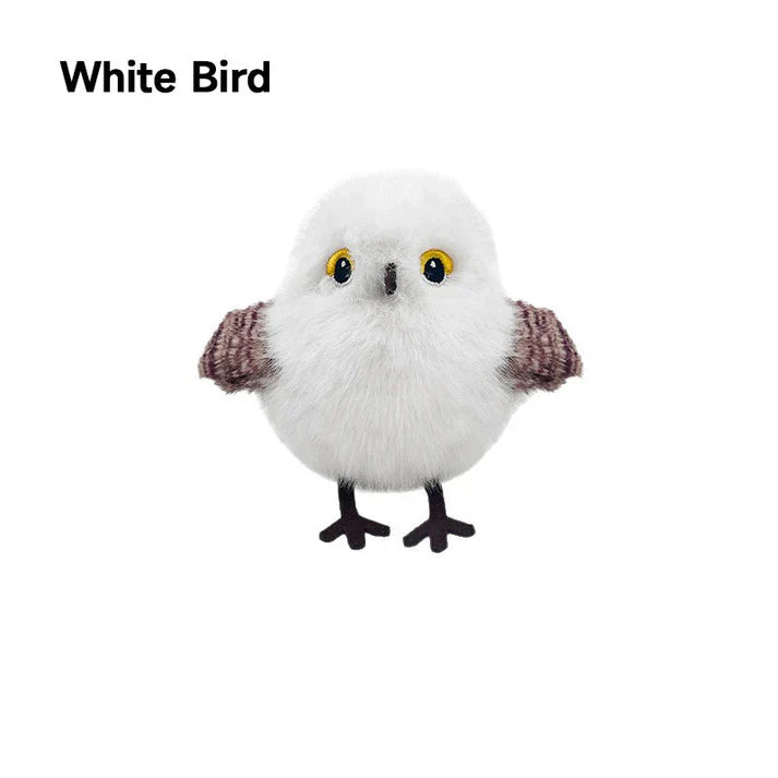 Livaktig interaktiv katteleke i form av en fugl