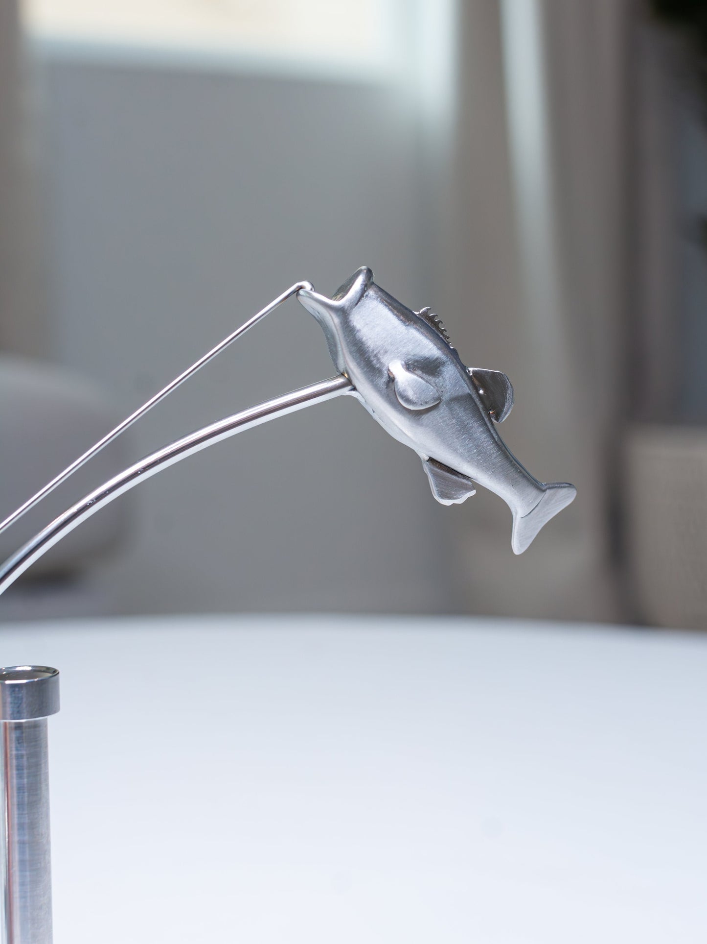 🎣Skulpturen med balanserende fisker