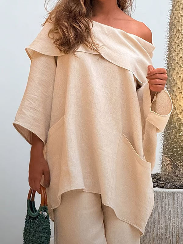 Dametopp med uregelmessig krage