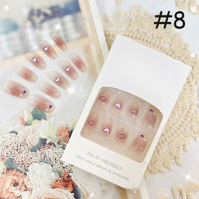 Bærbare trykk-på negleklistremerker