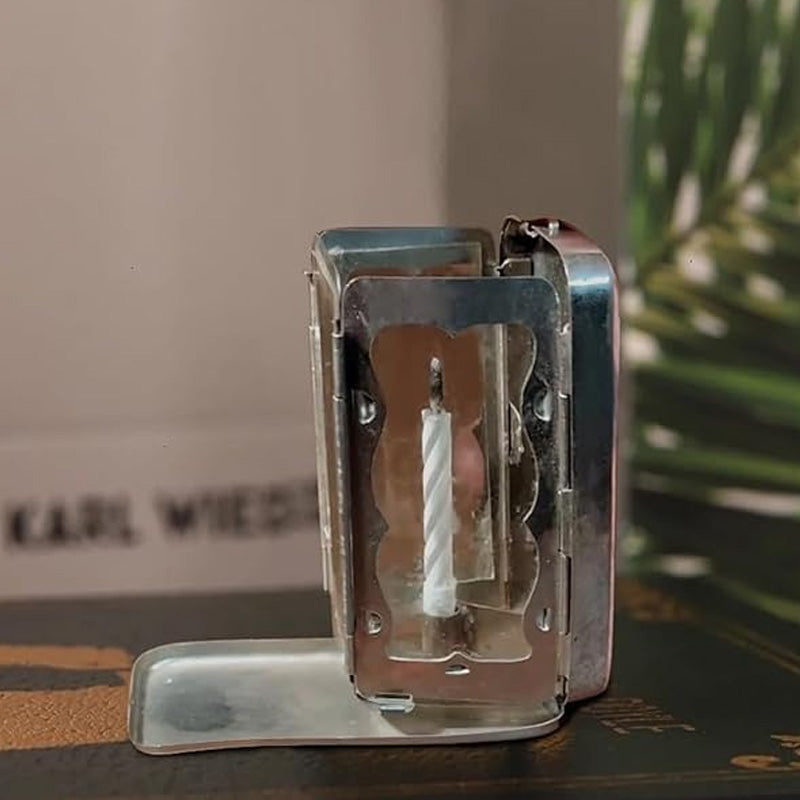 Sammenleggbar lommelyslykt med stearinlys