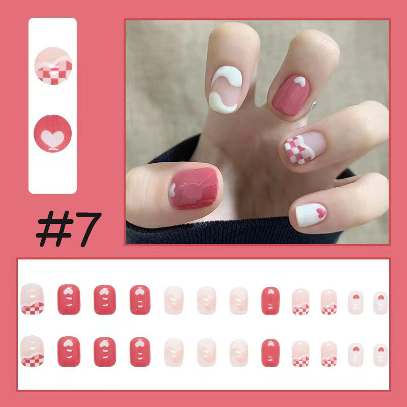 Bærbare trykk-på negleklistremerker