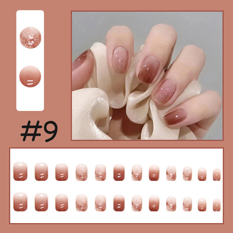 Bærbare trykk-på negleklistremerker