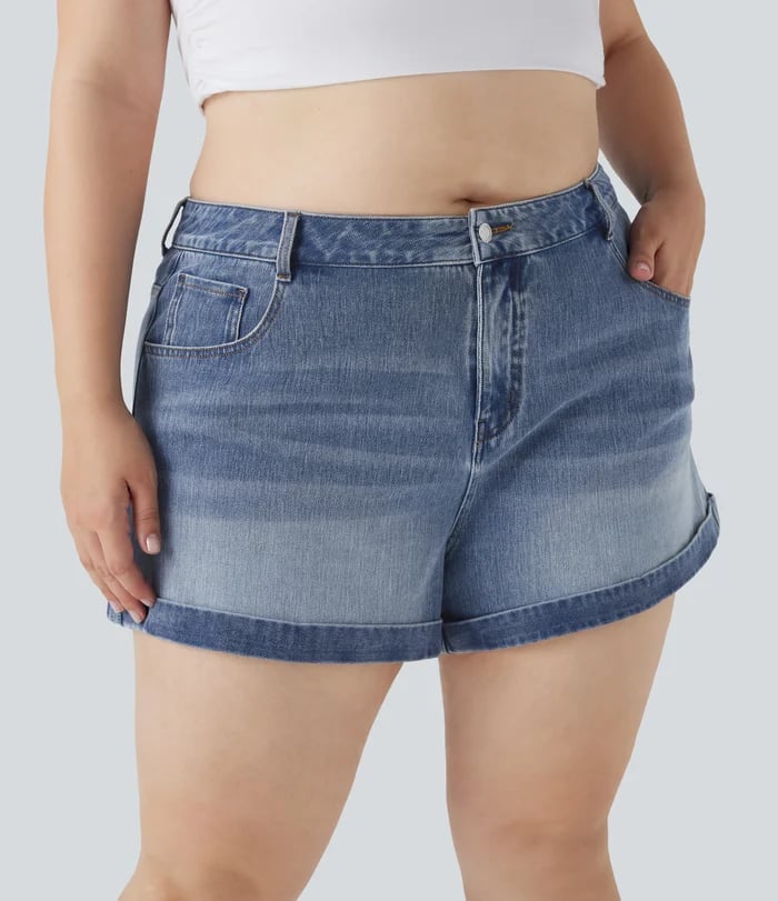 Mellomhøy midje med knapper og glidelås, flere lommer, elastisk strikket denimshorts med avslappet passfor