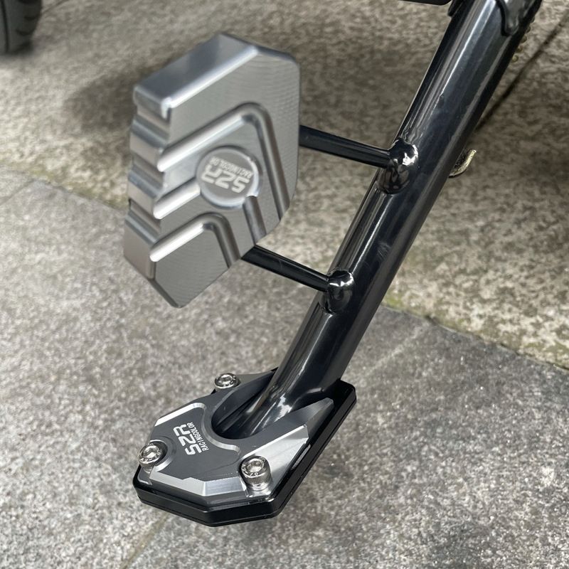 Forlengerpute for kickstativfot til motorsykkel